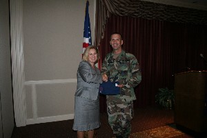 In April, attendees of the chapter's presentation of ROTC scholarships awards include Cadet Derek Geyer, Cadet Jeffrey Martz and Lt. Col. Kyna McCall, USAF.    